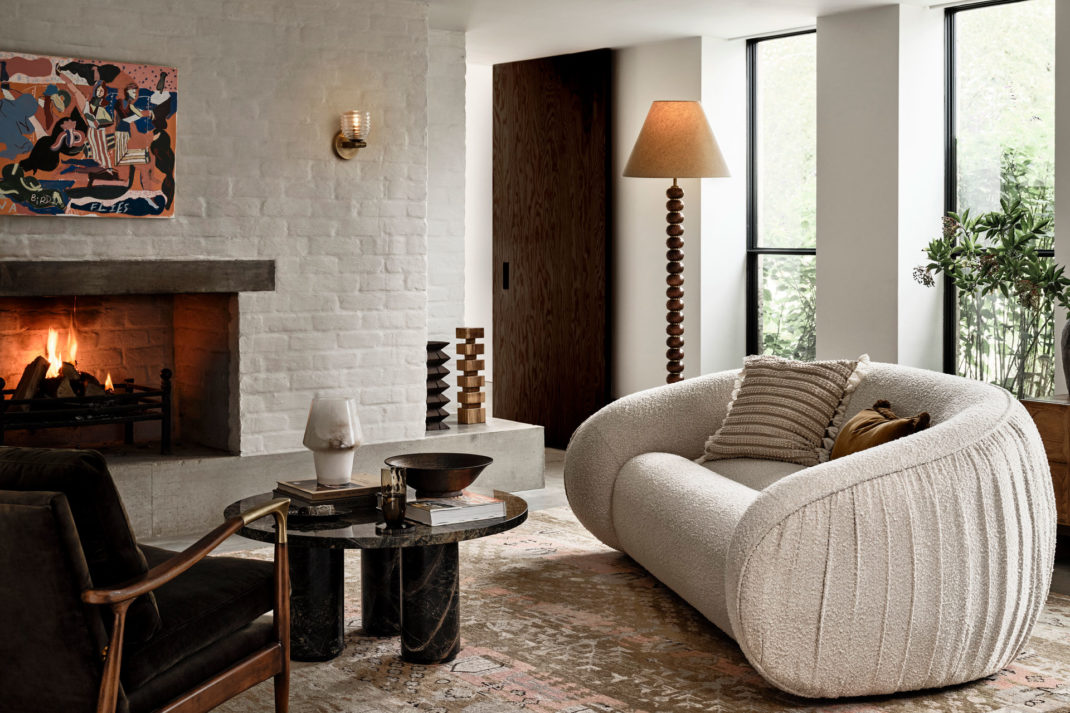The emet sofa in a living room by Soho Home