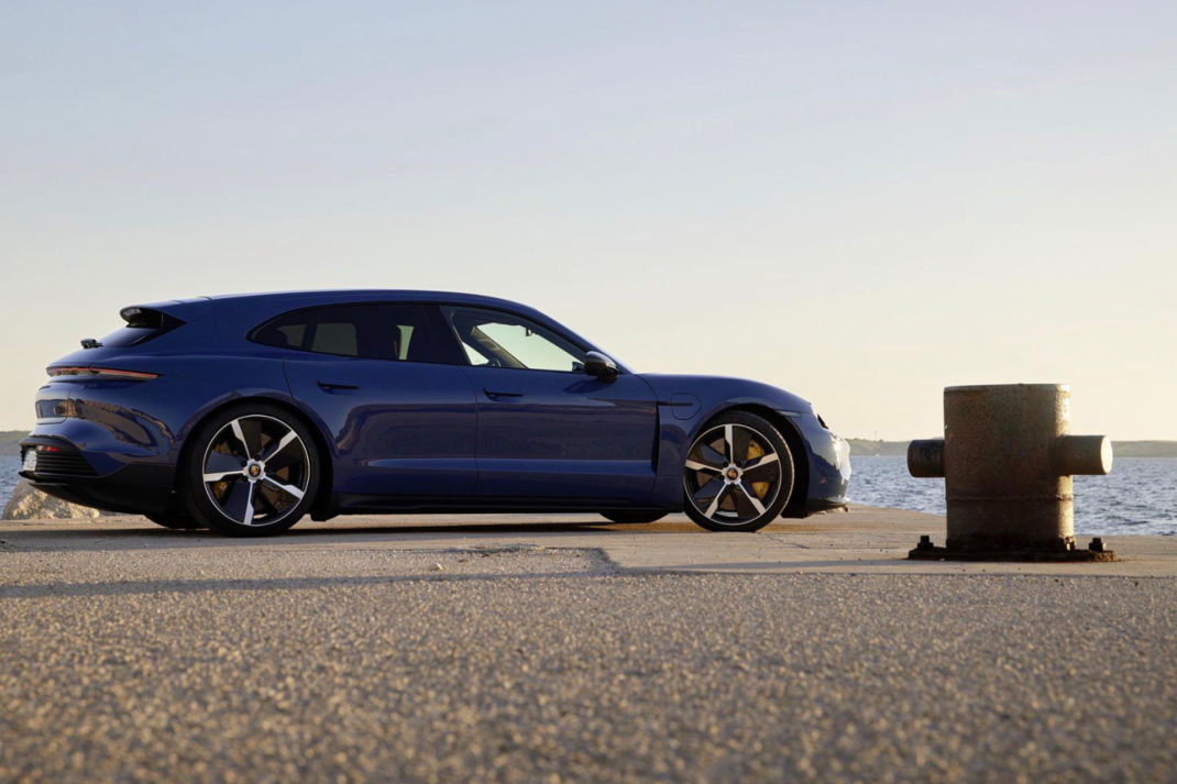 porsche electric car by the sea side view