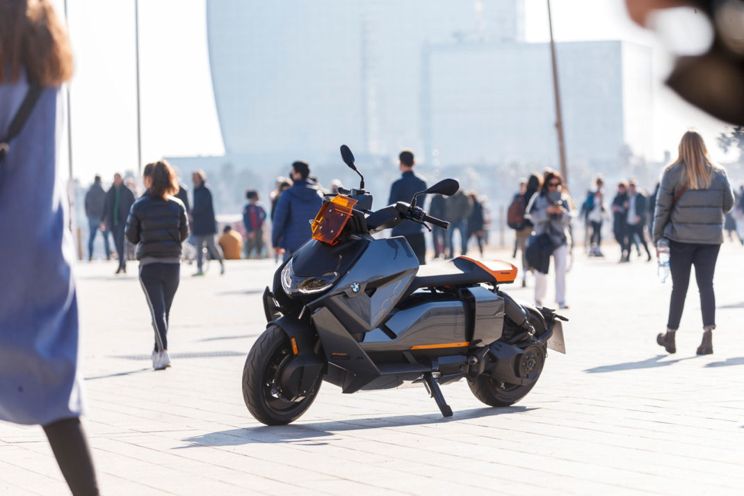 The BMW CE 04 moped in a city street