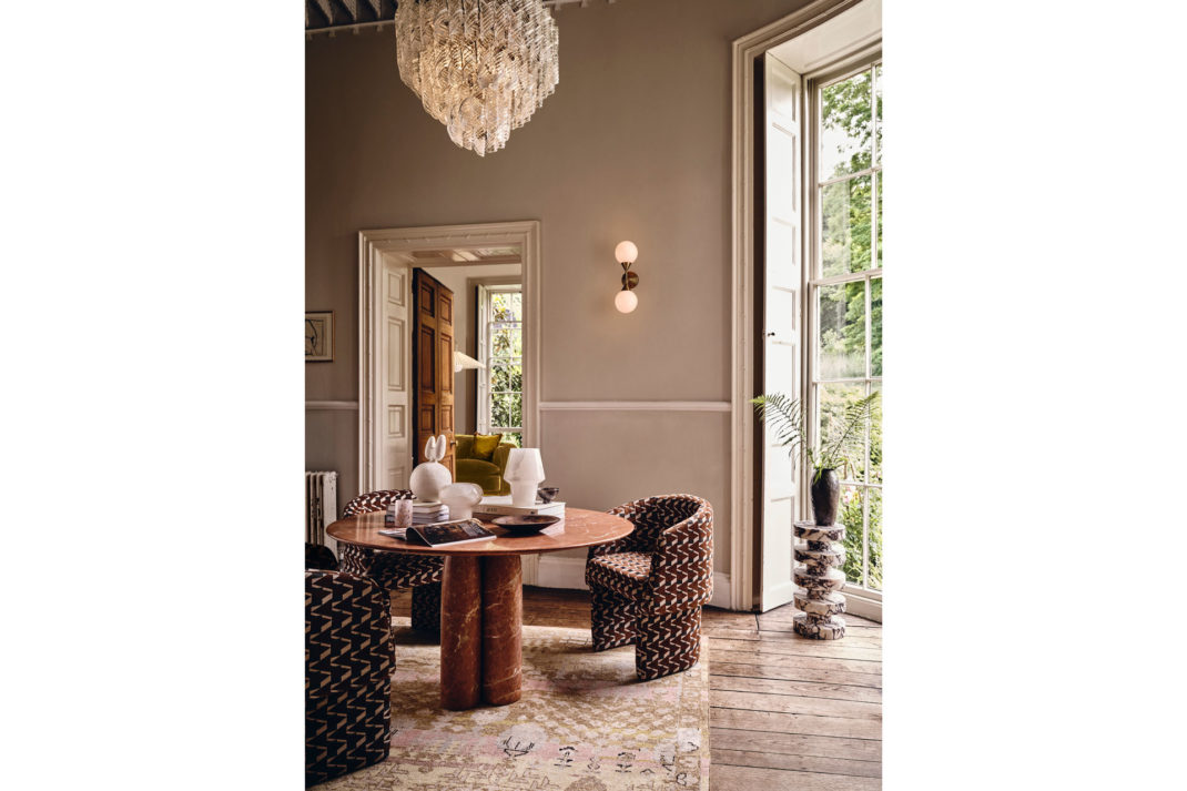 The Juliana Chandelier in a living room, by Soho Home