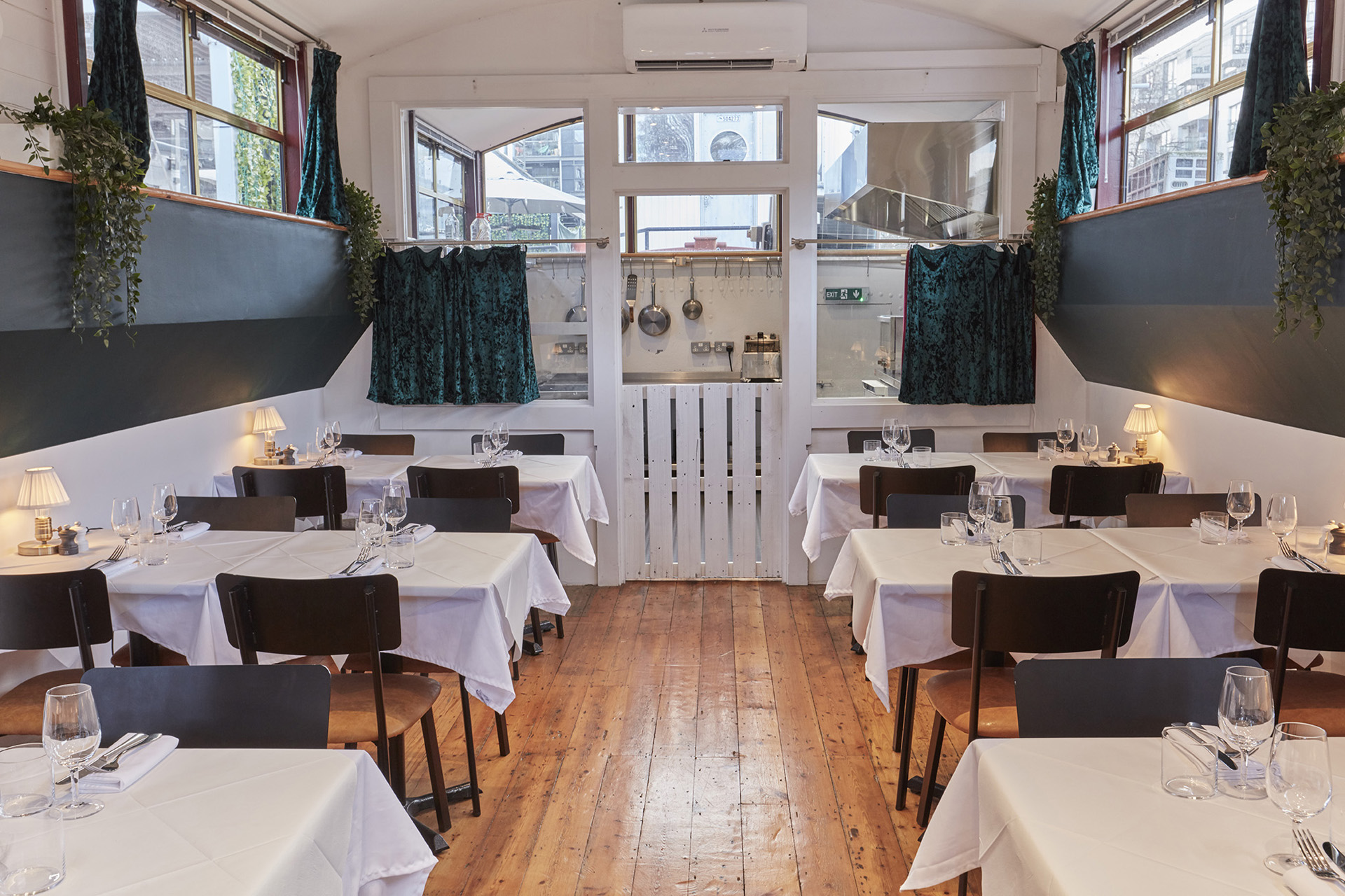 The inside and kitchen of Caravel