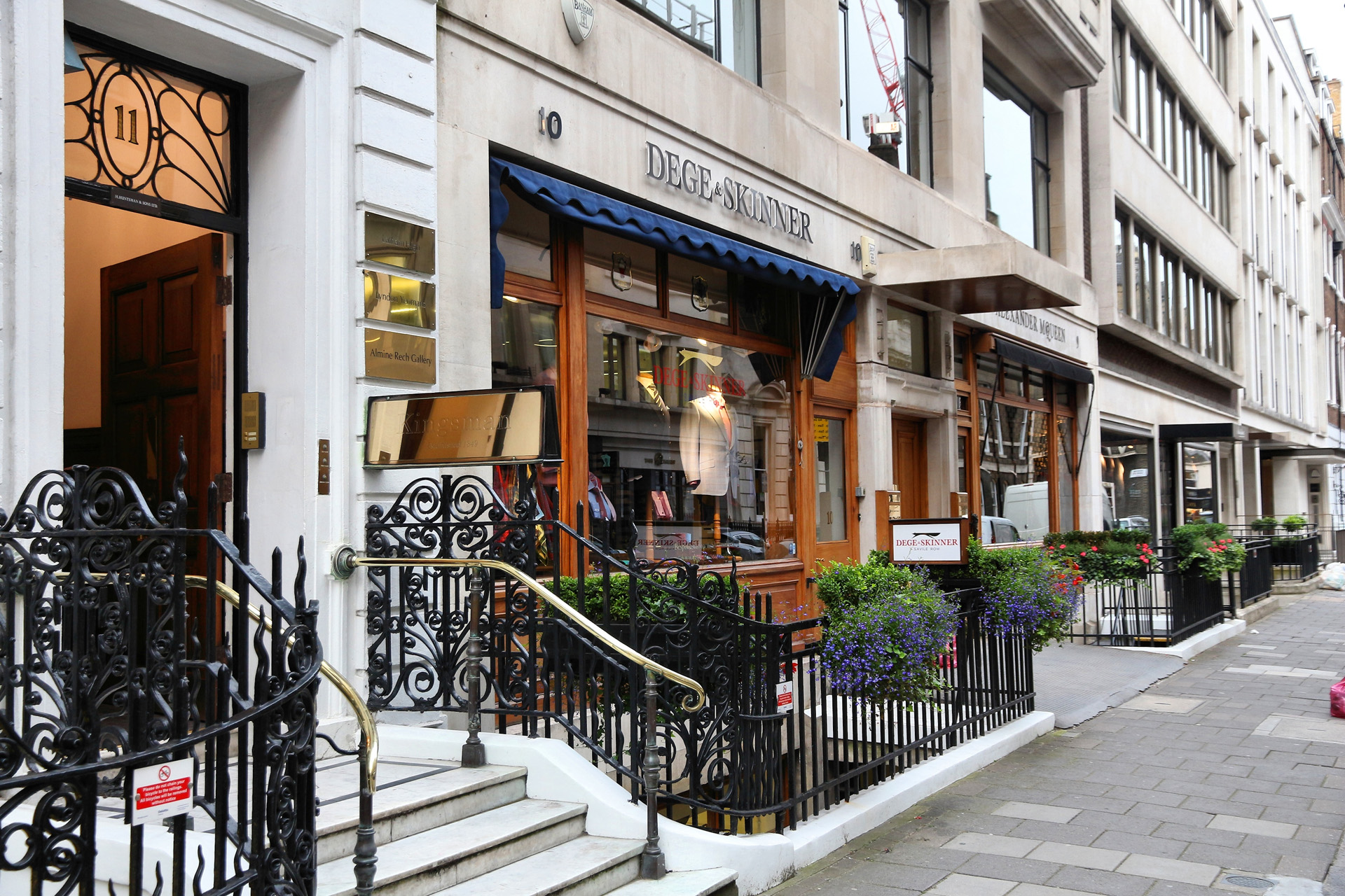 Tailor shops at Savile Row in London. Savile Row is a street in Mayfair, traditionally known for tailors.