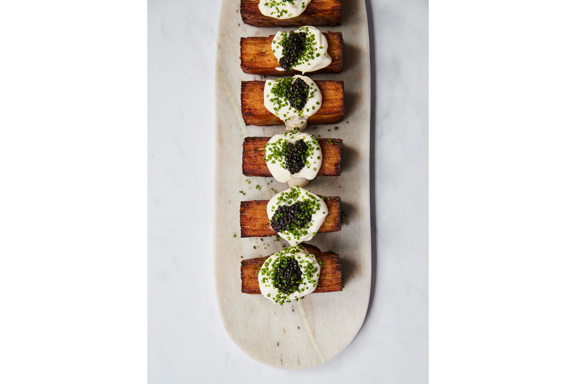 Pressed Potatoes, Estate Dairy Crème Fraiche & Caviar