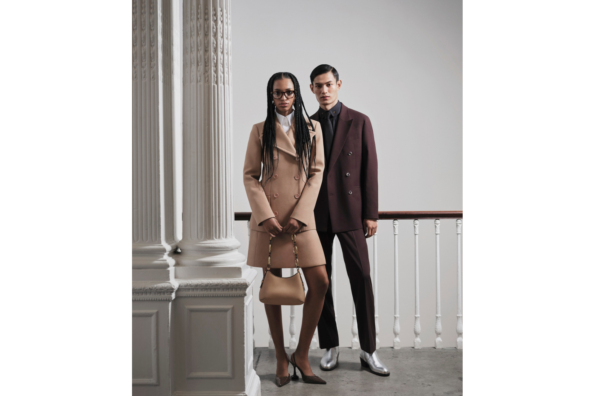 Man and woman in tailored clothing