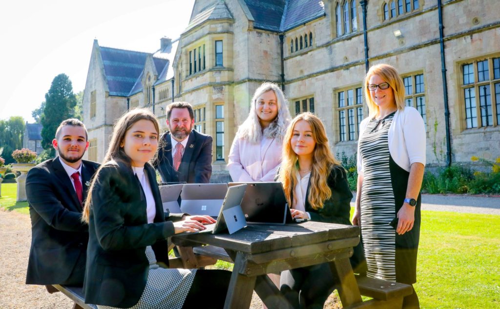 Photo by Rick Matthews. Myddelton students and staff, from left, Jack Wright, Ruthin, Libby Argent, Rhyl, Deputy Headmaster Ian Lloyd, teacher Bronya Morgan, from Denbigh, Ffion Lloyd, Dyserth, and teacher Bethan Tout, from Llangollen.