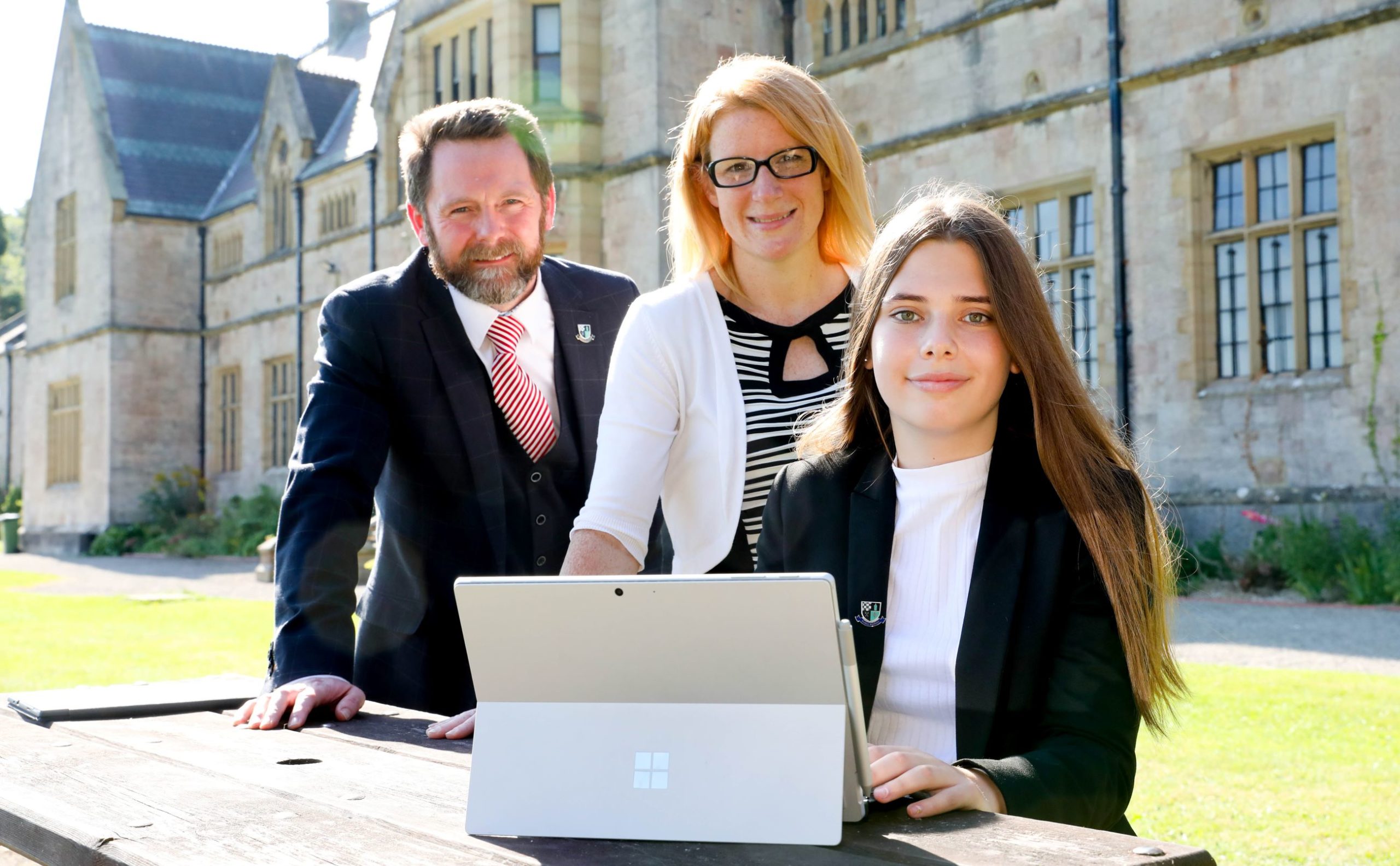 Photo by Rick Matthews. Myddelton College Deputy Headmaster Ian Lloyd and History, Politics and Business Studies teacher Bethan Tout and Sixth Former Libby Argent.