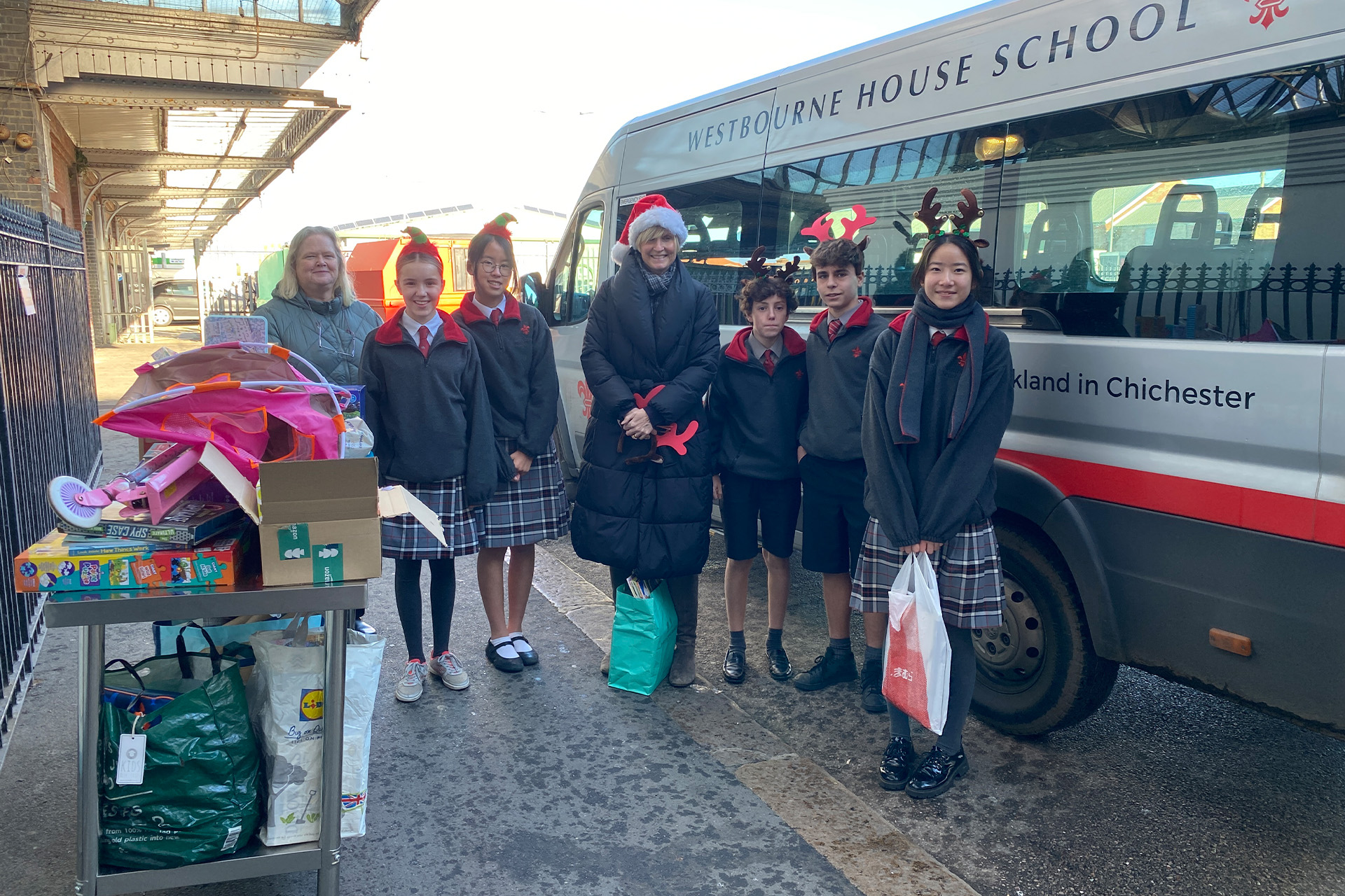 Chichester School Pupils Deliver Hundreds of Presents to Local Women's Charity