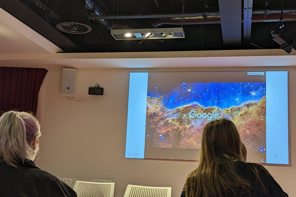 Pupils listening to a presentation at Google