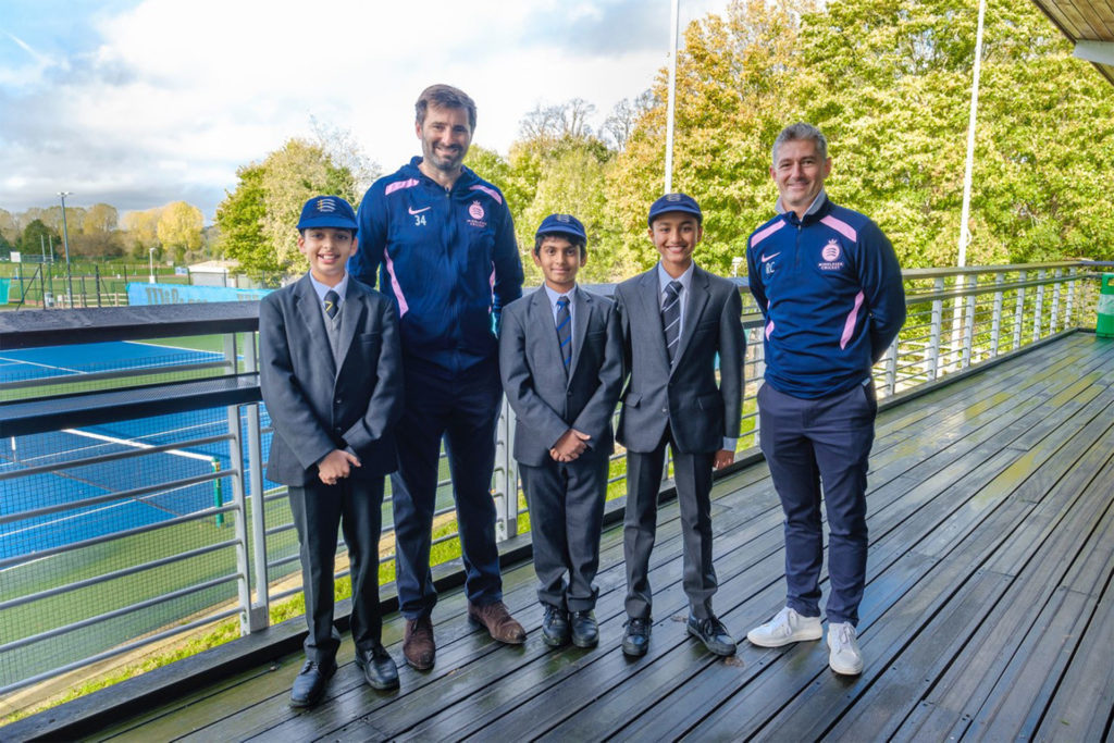Middlesex player Tim Murtagh and Middlesex Club Coach Rory Coutts pictured with MTS Year 9 pupils, Rishi, Rishane and Eashan