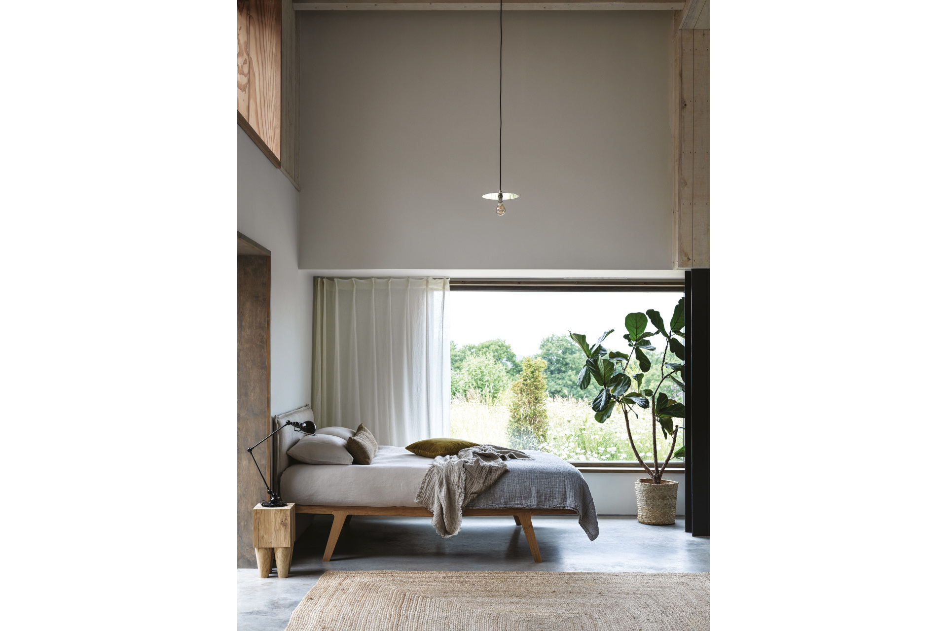 Bed in grey bedroom