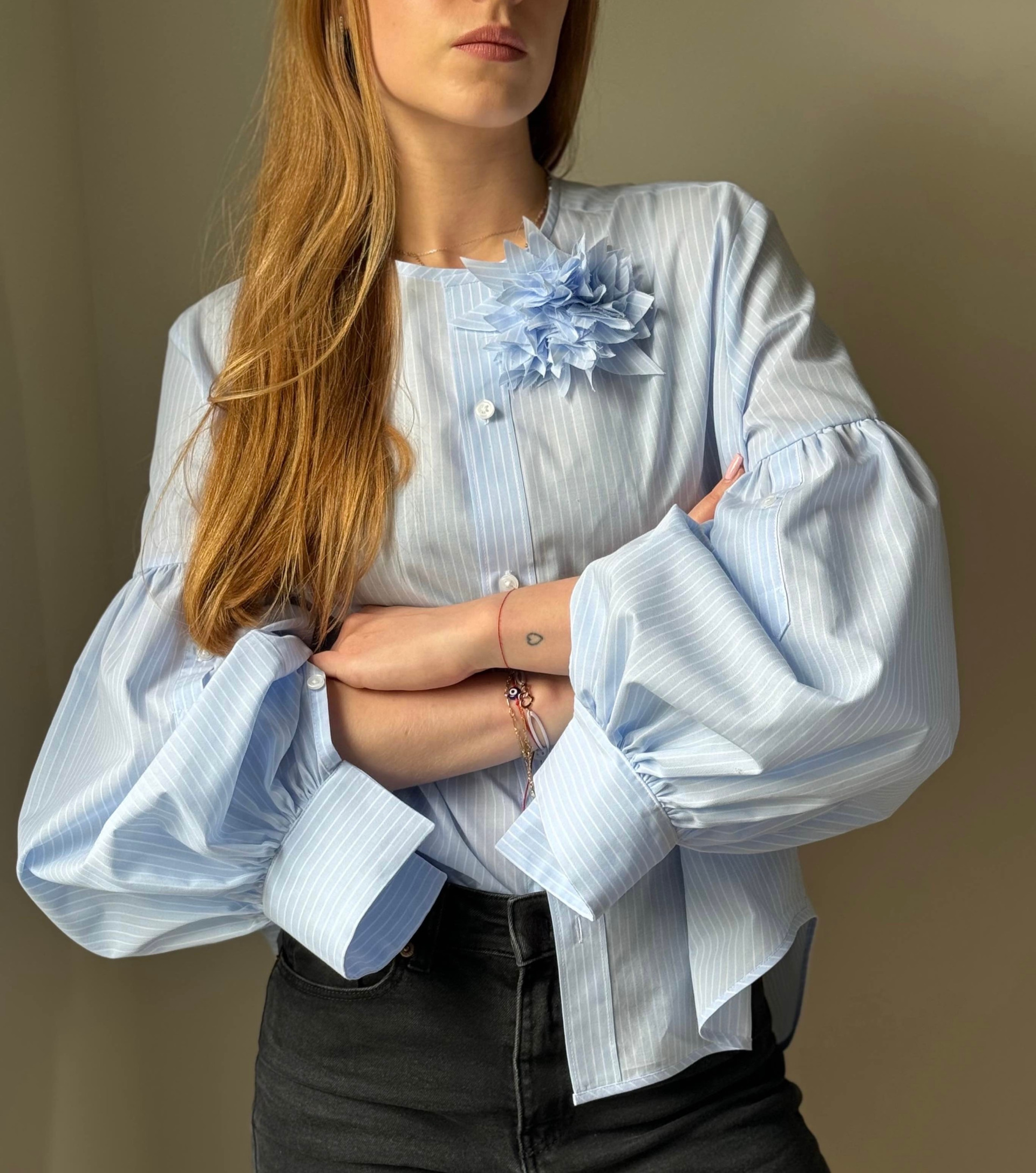 Woman wearing blue blouse