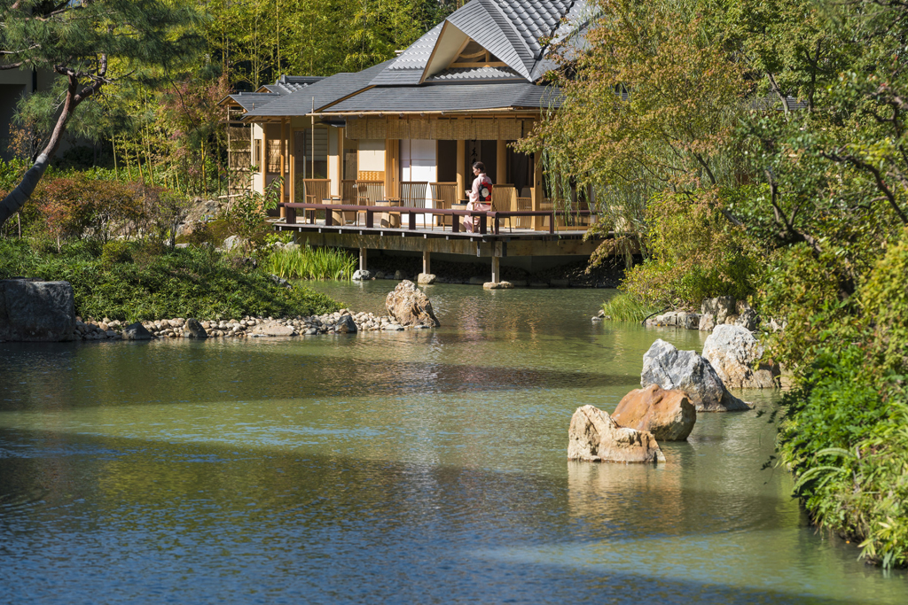 Exterior of Four Seasons Kyoto with a pond