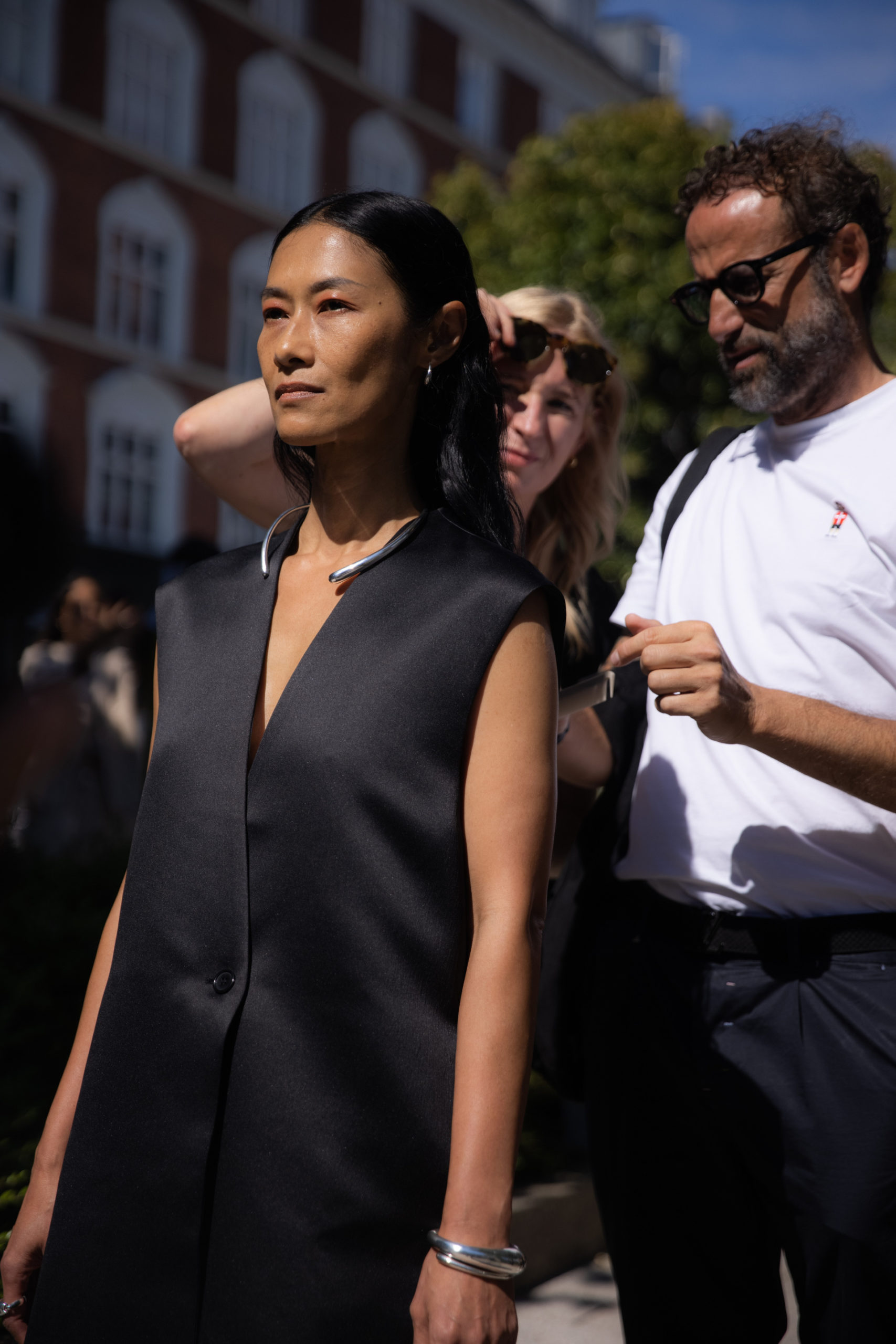 Woman getting fitted for runway