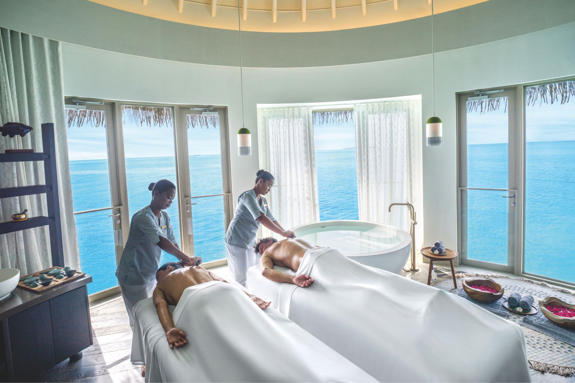 Couples massage at Intercontinental Maldives Maamunagau Resort