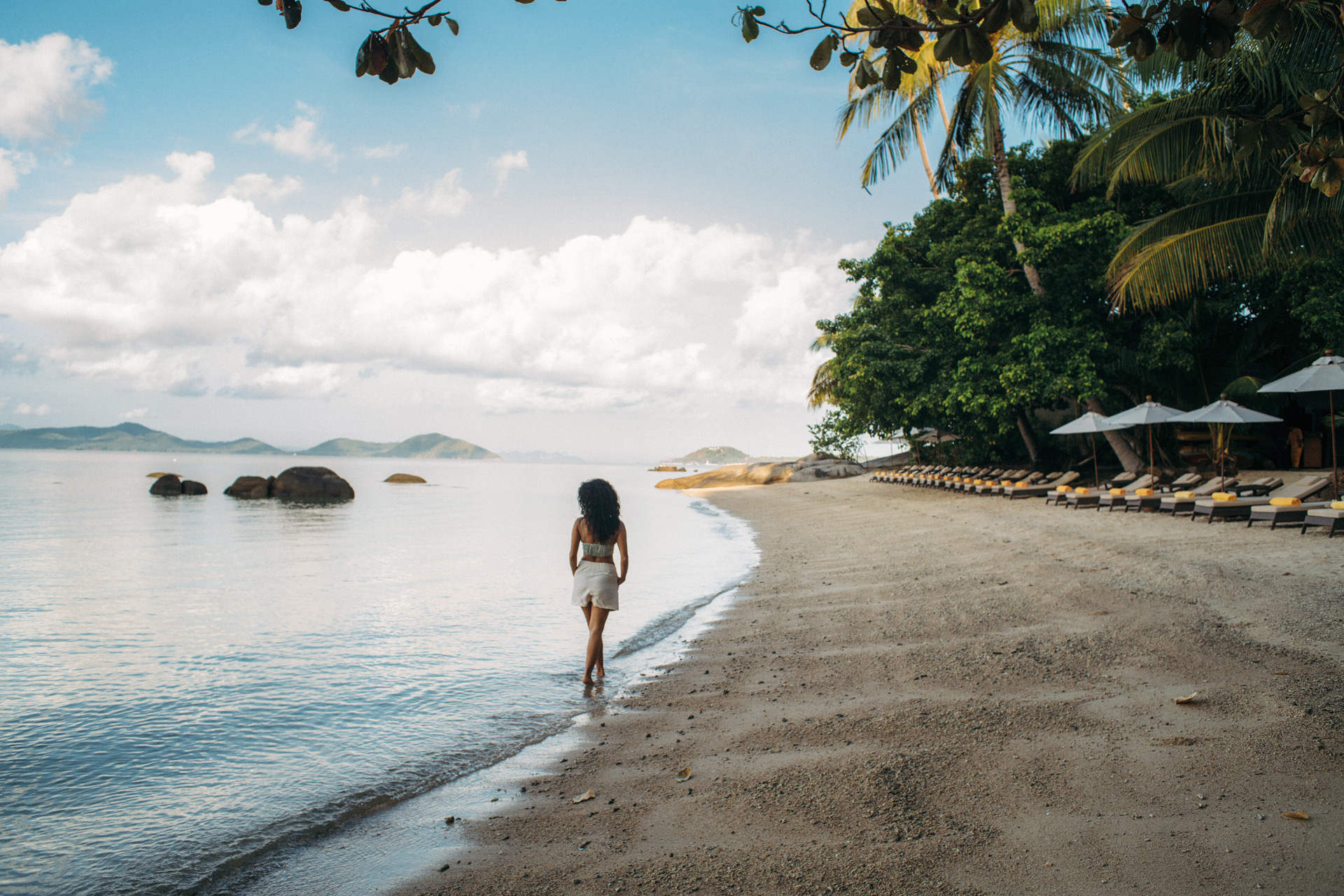 Woman walking on a beach